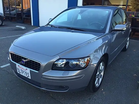 Same silver sedan after front-end repair