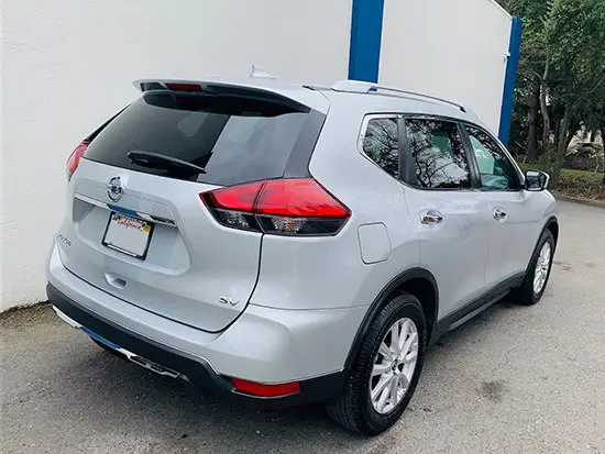 Same white SUV after rear-end repair